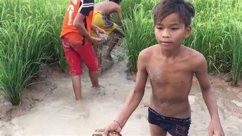 boy fishing|Village boys fishing .